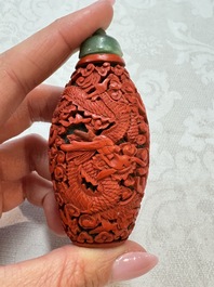 Nine Chinese cinnabar lacquer snuff bottles and a covered box, Qianlong marks, 19/20th C.