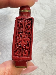 Nine Chinese cinnabar lacquer snuff bottles and a covered box, Qianlong marks, 19/20th C.