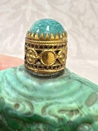 Five Chinese hardstone and glass snuff bottles, 20th C.