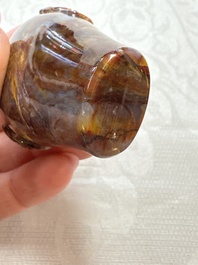 Five Chinese hardstone and glass snuff bottles, 20th C.