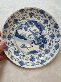 A pair of Chinese blue and white 'Hunting' plates, Chenghua marks, Kangxi