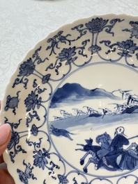 A pair of Chinese blue and white 'Hunting' plates, Chenghua marks, Kangxi