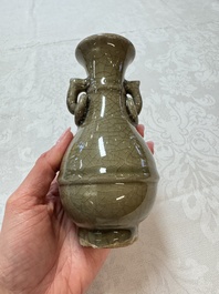 A Chinese Longquan celadon vase with handles, Ming