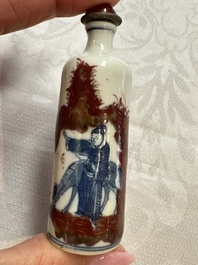 Five Chinese copper-red, blue and white, and polychrome snuff bottles, Yongzheng and Daoguang marks, 19/20th C.