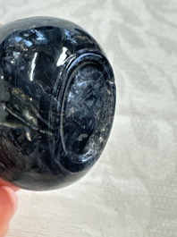 Five Chinese hardstone and glass snuff bottles, 20th C.