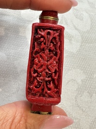 Nine Chinese cinnabar lacquer snuff bottles and a covered box, Qianlong marks, 19/20th C.