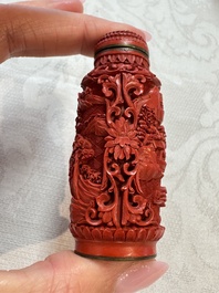 Nine Chinese cinnabar lacquer snuff bottles and a covered box, Qianlong marks, 19/20th C.