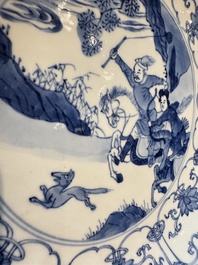 A pair of Chinese blue and white 'Hunting' plates, Chenghua marks, Kangxi