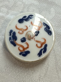 A Chinese iron-red 'Dragon' covered box, a blue and white '100 Boys' and a famille verte 'Fish' snuff bottle, Shunzhi mark, 19th C.