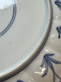 A pair of Chinese blue and white 'Hunting' plates, Chenghua marks, Kangxi