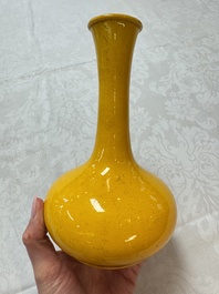 A Japanese Awaji yellow-glazed vase and a white-glazed 'Monkey' group, 19/20th C.