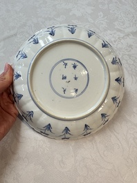 A pair of Chinese blue and white 'Hunting' plates, Chenghua marks, Kangxi