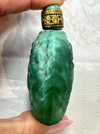 Five Chinese hardstone and glass snuff bottles, 20th C.