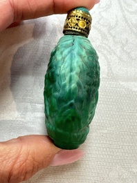 Five Chinese hardstone and glass snuff bottles, 20th C.