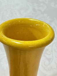 A Japanese Awaji yellow-glazed vase and a white-glazed 'Monkey' group, 19/20th C.