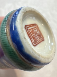 Five Chinese copper-red, blue and white, and polychrome snuff bottles, Yongzheng and Daoguang marks, 19/20th C.