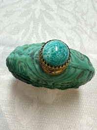 Five Chinese hardstone and glass snuff bottles, 20th C.