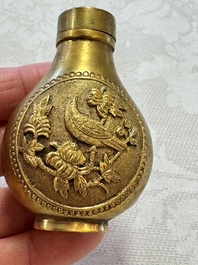 A Chinese gilt-bronze and mother-of-pearl-inlaid snuff bottle with birds among flowering branches, Guangxu mark and of the period