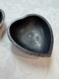 Nine Chinese cinnabar lacquer snuff bottles and a covered box, Qianlong marks, 19/20th C.