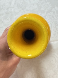 A Japanese Awaji yellow-glazed vase and a white-glazed 'Monkey' group, 19/20th C.