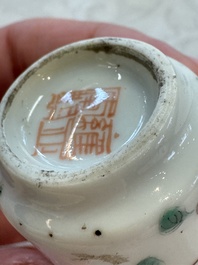 A group of four Chinese porcelain and agate snuff bottles, a miniature vase and a carved seed, Yongzheng and Qianlong marks, 19/20th C.