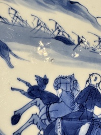 A pair of Chinese blue and white 'Hunting' plates, Chenghua marks, Kangxi