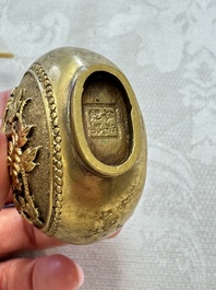 A Chinese gilt-bronze and mother-of-pearl-inlaid snuff bottle with birds among flowering branches, Guangxu mark and of the period
