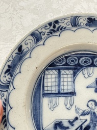 A pair of rare blue and white Dutch Delft 'Shoemaker' plates, 18th C.