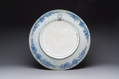 A massive Japanese blue and white 'Dragon among Sea Waves' dish, probably Arita, Meiji, 19th C.