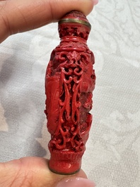 Nine Chinese cinnabar lacquer snuff bottles and a covered box, Qianlong marks, 19/20th C.