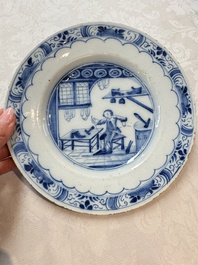 A pair of rare blue and white Dutch Delft 'Shoemaker' plates, 18th C.