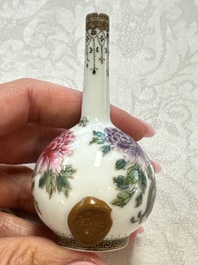 A group of four Chinese porcelain and agate snuff bottles, a miniature vase and a carved seed, Yongzheng and Qianlong marks, 19/20th C.
