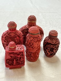 Nine Chinese cinnabar lacquer snuff bottles and a covered box, Qianlong marks, 19/20th C.