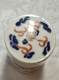 A Chinese iron-red 'Dragon' covered box, a blue and white '100 Boys' and a famille verte 'Fish' snuff bottle, Shunzhi mark, 19th C.