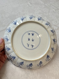A Chinese blue and white 'Elegant Ladies Making Music' plate, Chenghua mark, Kangxi
