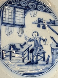 A pair of rare blue and white Dutch Delft 'Shoemaker' plates, 18th C.