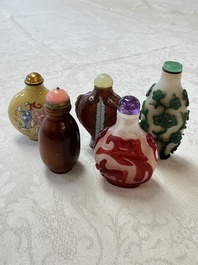 Five various Chinese cloisonn&eacute;, glass, horn and enamel snuff bottles, Qianlong mark, 19/20th C.
