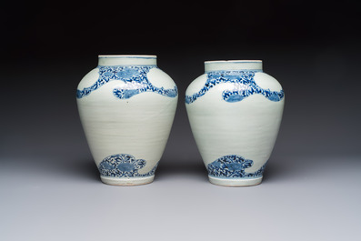 A pair of unusual Japanese Arita blue and white 'Unfinished' vases, Edo, 17/18th C.