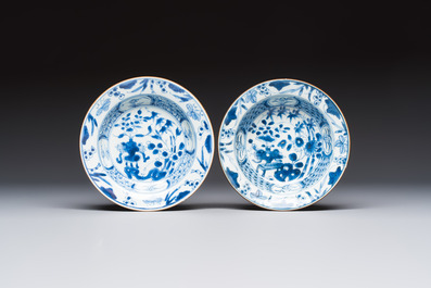 Six Chinese blue and white plates, a dish and a large tile, Yongzheng/Qianlong