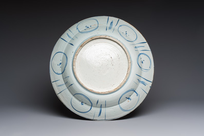 A very large Chinese blue and white 'Kraak' dish with geese by the water, Wanli