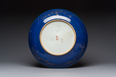 A large Chinese gilt-decorated powder-blue-ground 'Dragon' dish on a later wooden stand, Guangxu mark and of the period