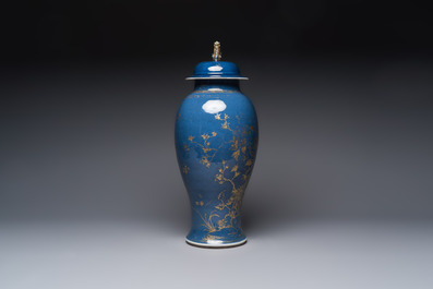 A Chinese gilt-decorated powder-blue-ground 'Phoenix among Blossoming Branches' vase, Qianlong