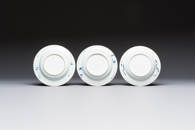 Six Chinese blue and white plates, a dish and a large tile, Yongzheng/Qianlong