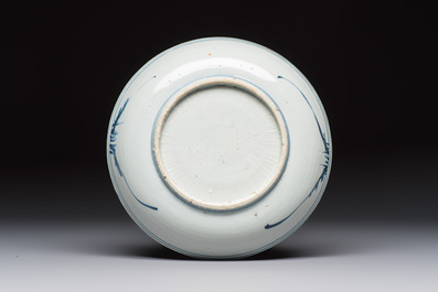 A Chinese blue and white ko-sometsuke 'Buffalo Herder' plate for the Japanese market, Tianqi