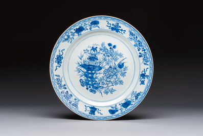 Six Chinese blue and white plates, a dish and a large tile, Yongzheng/Qianlong