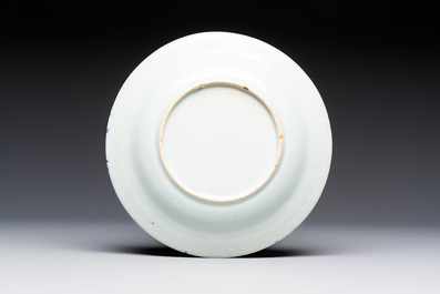 Six Chinese blue and white plates, a dish and a large tile, Yongzheng/Qianlong