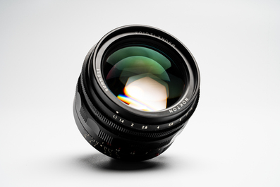A Voigtl&auml;nder Nokton 50 mm F1.1 lens and hood