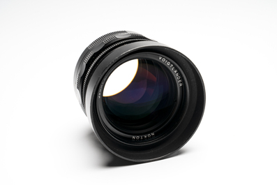A Voigtl&auml;nder Nokton 50 mm F1.1 lens and hood