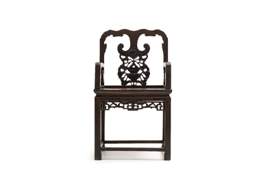 A Chinese carved hongmu armchair, 19th C.