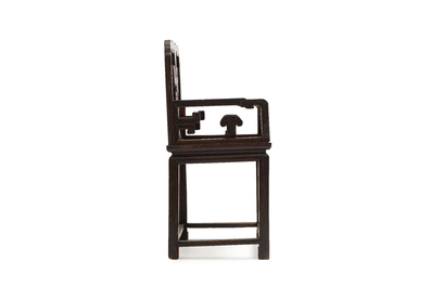 A Chinese carved hongmu armchair, 19th C.